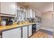 Bright kitchen featuring ample cabinetry and modern appliances at 201 S Greenfield Rd # 142, Mesa, AZ 85206