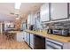 Open kitchen with island and breakfast bar, perfect for entertaining at 201 S Greenfield Rd # 142, Mesa, AZ 85206