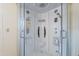 Modern corner shower with multiple shower heads at 201 S Greenfield Rd # 142, Mesa, AZ 85206