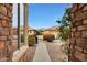 Brick walkway leading to the front door with mountain views at 22555 W Antelope Trl, Buckeye, AZ 85326