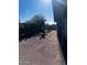 Landscaped backyard with gravel and small trees at 2853 W Ohio St, Apache Junction, AZ 85120