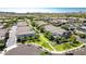 Aerial view of community with solar panels and landscaping at 29068 N 124Th Dr, Peoria, AZ 85383