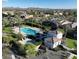 Community pool and recreation area with surrounding landscaping at 29068 N 124Th Dr, Peoria, AZ 85383