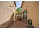 Small backyard with patio, table, and umbrella at 29068 N 124Th Dr, Peoria, AZ 85383