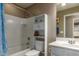 Clean bathroom with shower/tub combo, vanity, and storage at 29068 N 124Th Dr, Peoria, AZ 85383