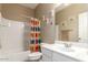 Bathroom with shower/tub combo and white vanity at 29068 N 124Th Dr, Peoria, AZ 85383