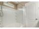 Clean bathroom with shower/tub combo and updated tile at 29068 N 124Th Dr, Peoria, AZ 85383