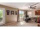 Bright bonus room with access to balcony, drum set, guitars, and ample natural light at 29068 N 124Th Dr, Peoria, AZ 85383