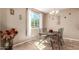 Cozy dining area featuring a small table and chairs at 29068 N 124Th Dr, Peoria, AZ 85383