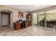 Home office with built-in cabinetry and access to a private patio at 29068 N 124Th Dr, Peoria, AZ 85383