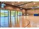 Bright and spacious indoor basketball court with large windows at 29068 N 124Th Dr, Peoria, AZ 85383