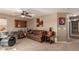 Music room with drum set, guitars, and couch at 29068 N 124Th Dr, Peoria, AZ 85383
