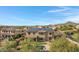 Two-story house with solar panels, pool, and mountain views at 31271 N 133Rd Dr, Peoria, AZ 85383