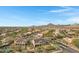 Two-story house with solar panels, pool, and mountain views at 31271 N 133Rd Dr, Peoria, AZ 85383
