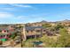 Two-story house with solar panels, pool, and mountain views at 31271 N 133Rd Dr, Peoria, AZ 85383
