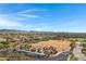Aerial view of a community park with playground, ramadas, and parking at 31271 N 133Rd Dr, Peoria, AZ 85383