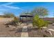 Relaxing backyard with gazebo and desert landscaping at 31271 N 133Rd Dr, Peoria, AZ 85383