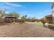 Spacious backyard with a pool, gazebo, and patio area at 31271 N 133Rd Dr, Peoria, AZ 85383