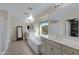 Elegant bathroom with double sinks, soaking tub, and walk-in shower at 31271 N 133Rd Dr, Peoria, AZ 85383