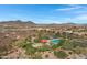 Community pool with playground, ramadas and desert mountain views at 31271 N 133Rd Dr, Peoria, AZ 85383