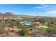 Community pool and park with playground, ramadas, and desert landscape at 31271 N 133Rd Dr, Peoria, AZ 85383