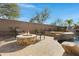 Relaxing fire pit area with comfortable seating near the pool at 31271 N 133Rd Dr, Peoria, AZ 85383