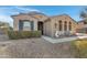 Two-story house with landscaping and walkway at 31271 N 133Rd Dr, Peoria, AZ 85383