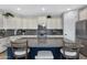 Elegant kitchen featuring granite countertops and stainless steel appliances at 31271 N 133Rd Dr, Peoria, AZ 85383