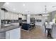 Spacious kitchen featuring granite countertops and an island at 31271 N 133Rd Dr, Peoria, AZ 85383