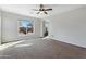 Bright and airy living room with backyard access at 31271 N 133Rd Dr, Peoria, AZ 85383