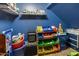 Neatly organized toy room with ample storage shelving at 31271 N 133Rd Dr, Peoria, AZ 85383