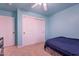 Bedroom with sliding door closet and ceiling fan at 3770 E Graythorn Way, Coolidge, AZ 85128