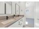 Double vanity bathroom with gray countertop and matte black fixtures at 4511 N 38Th Pl, Phoenix, AZ 85018