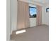 Spacious bedroom with neutral carpeting and large window at 4511 N 38Th Pl, Phoenix, AZ 85018