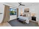 Bright bedroom with neutral decor and large window at 4511 N 38Th Pl, Phoenix, AZ 85018