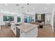 Open kitchen with large island, stainless steel appliances, and backyard access at 4511 N 38Th Pl, Phoenix, AZ 85018