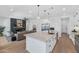 Open kitchen with a large island and views into the living room and backyard at 4511 N 38Th Pl, Phoenix, AZ 85018