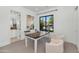 Home office with built-in desk and adjacent bathroom at 4511 N 38Th Pl, Phoenix, AZ 85018