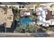 Aerial view of community pool and surrounding buildings at 4805 N Woodmere Fairway -- # 1003, Scottsdale, AZ 85251