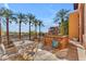 Private patio with table and chairs, offering scenic views at 4805 N Woodmere Fairway -- # 1003, Scottsdale, AZ 85251