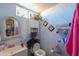 Small bathroom with a toilet and shower at 53129 W Badger Rd, Maricopa, AZ 85139