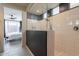 Spa-like bathroom with walk-in shower and glass enclosure at 6807 W Winston Dr, Laveen, AZ 85339