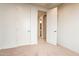 Simple bedroom with two closets and access to hallway bathroom at 6807 W Winston Dr, Laveen, AZ 85339