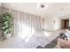 Spacious living room with modern wall decor and large windows at 6807 W Winston Dr, Laveen, AZ 85339