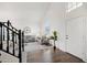 Bright living room with hardwood floors and a high ceiling at 7270 Nw Tina Ln, Glendale, AZ 85310