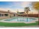 Relaxing kidney shaped pool with a patio and artificial turf at 7918 E Dale Ln, Scottsdale, AZ 85266