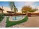 Spacious backyard oasis featuring a kidney-shaped pool and pergola at 7918 E Dale Ln, Scottsdale, AZ 85266