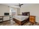 Bright bedroom with wood flooring, a comfy bed, and ample natural light at 7918 E Dale Ln, Scottsdale, AZ 85266