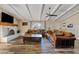 Spacious living room with hardwood floors, fireplace and large windows at 7918 E Dale Ln, Scottsdale, AZ 85266