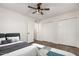 A bright bedroom features ample closet space and contemporary design elements at 8039 E Madero Ave, Mesa, AZ 85209